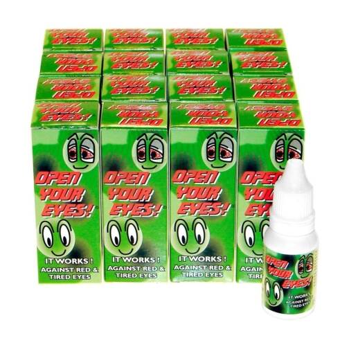 Boîtes vertes alignées du produit "Open Your Eyes!" accompagnées d'un petit flacon blanc. L'emballage affiche un dessin d'yeux rouges et fatigués qui deviennent clairs après utilisation. Mention "It works! Against red & tired eyes".
