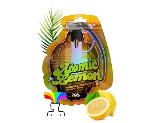 Cartouche de vape "Atomic Lemon" en packaging grenade jaune, accompagnée de citrons et d’une feuille verte.